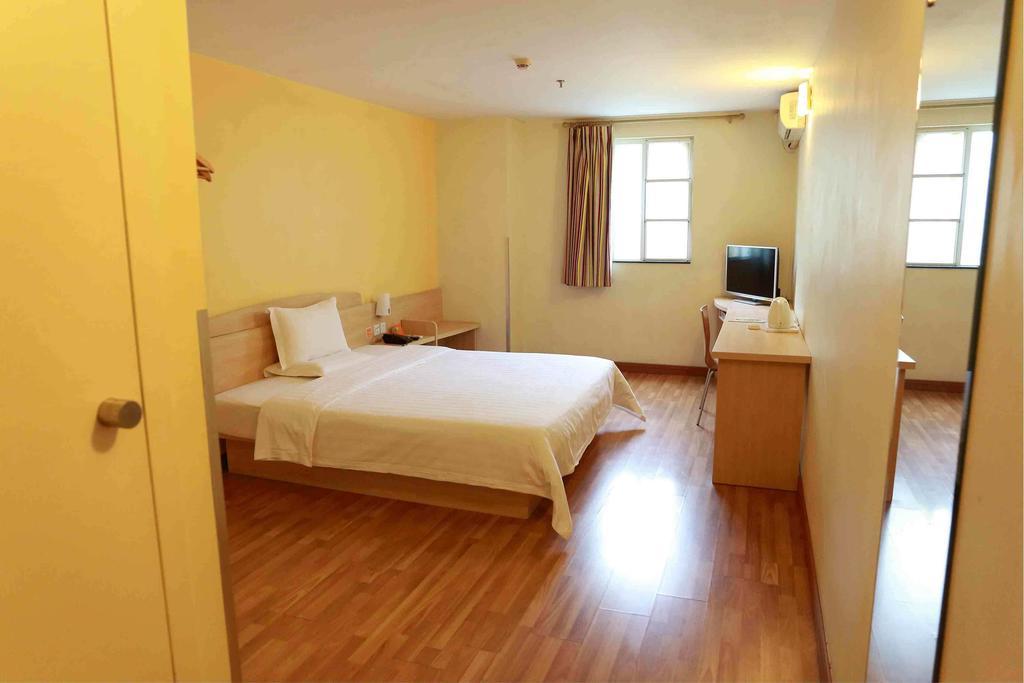 7Days Inn Bazhong Nanchi South Road Phoenix City Habitación foto
